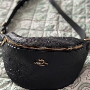 Pre-loved great condition Coach belt/sling bag , debossed C pattern